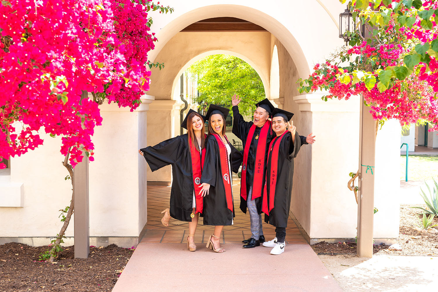 graduates posing