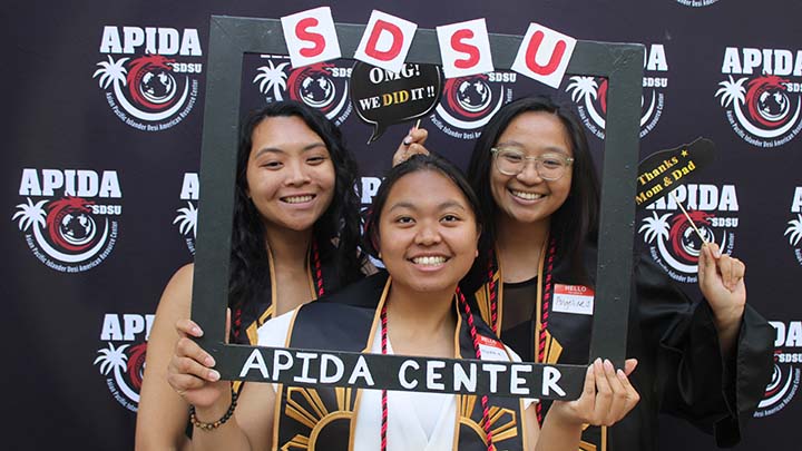 (From left) Jeradhine Adriano, Madeline Delacruz and Angeline Paguia posed for a photograph at the 2024 APIDA graduation event.